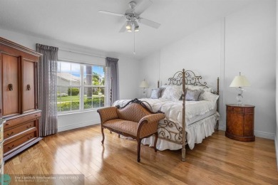 With serene views of the water and golf course, a 2021 roof, and on The Boca Country Club in Florida - for sale on GolfHomes.com, golf home, golf lot