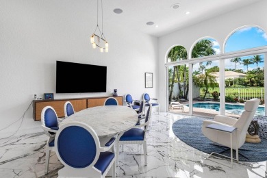 Soaring two-story ceiling heights greet you upon entering this on Polo Club of Boca Raton in Florida - for sale on GolfHomes.com, golf home, golf lot