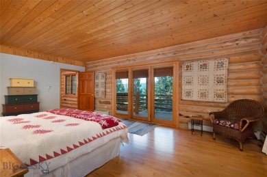 This charming log home, nestled in the trees and perched above on Big Sky of Montana Golf Course in Montana - for sale on GolfHomes.com, golf home, golf lot