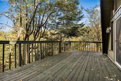 Step into this beautiful remodeled A frame cabin-a timeless on Lake Arrowhead Country Club in California - for sale on GolfHomes.com, golf home, golf lot