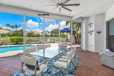 Soaring two-story ceiling heights greet you upon entering this on Polo Club of Boca Raton in Florida - for sale on GolfHomes.com, golf home, golf lot