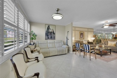 *Welcome to this charming 2-bedroom, 2-bathroom condo in the on Sunrise Lakes Phase III in Florida - for sale on GolfHomes.com, golf home, golf lot