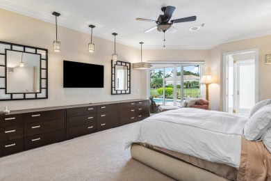 Soaring two-story ceiling heights greet you upon entering this on Polo Club of Boca Raton in Florida - for sale on GolfHomes.com, golf home, golf lot