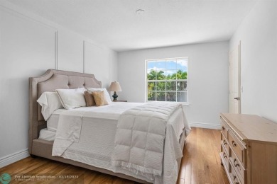 With serene views of the water and golf course, a 2021 roof, and on The Boca Country Club in Florida - for sale on GolfHomes.com, golf home, golf lot
