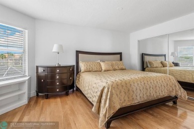 With serene views of the water and golf course, a 2021 roof, and on The Boca Country Club in Florida - for sale on GolfHomes.com, golf home, golf lot