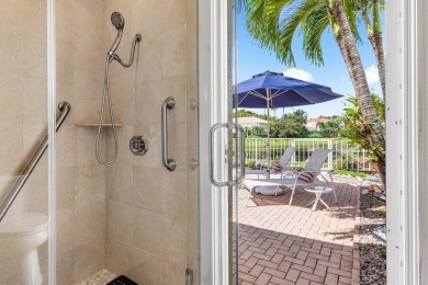 Soaring two-story ceiling heights greet you upon entering this on Polo Club of Boca Raton in Florida - for sale on GolfHomes.com, golf home, golf lot