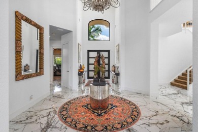 Soaring two-story ceiling heights greet you upon entering this on Polo Club of Boca Raton in Florida - for sale on GolfHomes.com, golf home, golf lot