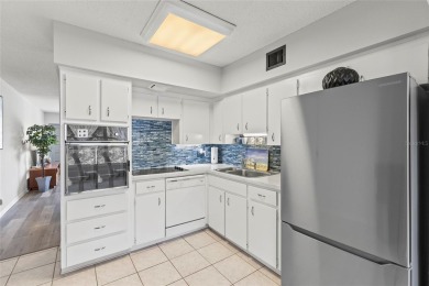 Charming 2 Bedroom, 2 Bath Condo located in the highly sought on On Top Of The World Golf Course in Florida - for sale on GolfHomes.com, golf home, golf lot