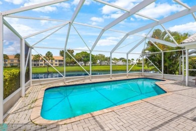 With serene views of the water and golf course, a 2021 roof, and on The Boca Country Club in Florida - for sale on GolfHomes.com, golf home, golf lot