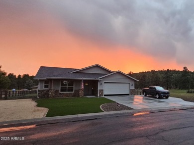 Welcome to this beautifully crafted 3-bedroom, 2.5-bath home on Elephant Rocks at Williams in Arizona - for sale on GolfHomes.com, golf home, golf lot
