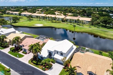 With serene views of the water and golf course, a 2021 roof, and on The Boca Country Club in Florida - for sale on GolfHomes.com, golf home, golf lot