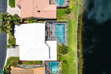 With serene views of the water and golf course, a 2021 roof, and on The Boca Country Club in Florida - for sale on GolfHomes.com, golf home, golf lot