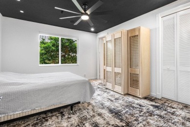 Soaring two-story ceiling heights greet you upon entering this on Polo Club of Boca Raton in Florida - for sale on GolfHomes.com, golf home, golf lot