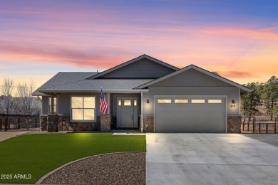 Welcome to this beautifully crafted 3-bedroom, 2.5-bath home on Elephant Rocks at Williams in Arizona - for sale on GolfHomes.com, golf home, golf lot