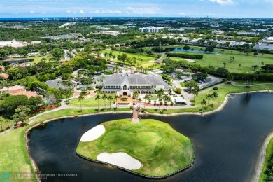 With serene views of the water and golf course, a 2021 roof, and on The Boca Country Club in Florida - for sale on GolfHomes.com, golf home, golf lot