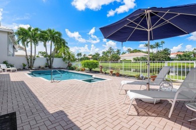 Soaring two-story ceiling heights greet you upon entering this on Polo Club of Boca Raton in Florida - for sale on GolfHomes.com, golf home, golf lot