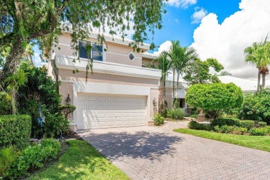 Soaring two-story ceiling heights greet you upon entering this on Polo Club of Boca Raton in Florida - for sale on GolfHomes.com, golf home, golf lot