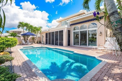 Soaring two-story ceiling heights greet you upon entering this on Polo Club of Boca Raton in Florida - for sale on GolfHomes.com, golf home, golf lot