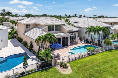 Soaring two-story ceiling heights greet you upon entering this on Polo Club of Boca Raton in Florida - for sale on GolfHomes.com, golf home, golf lot