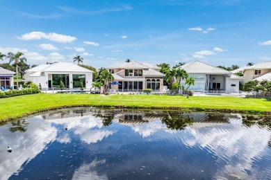 Soaring two-story ceiling heights greet you upon entering this on Polo Club of Boca Raton in Florida - for sale on GolfHomes.com, golf home, golf lot