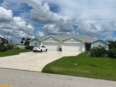 A unique opportunity to own a custom-built duplex with 2 car on Duffys Golf Center in Florida - for sale on GolfHomes.com, golf home, golf lot