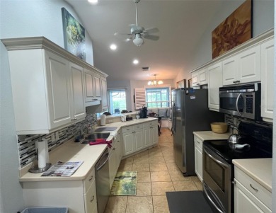 A unique opportunity to own a custom-built duplex with 2 car on Duffys Golf Center in Florida - for sale on GolfHomes.com, golf home, golf lot
