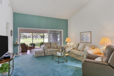 Discover the epitome of comfort and elegance in this spacious on Palm Aire Country Club of Sarasota in Florida - for sale on GolfHomes.com, golf home, golf lot