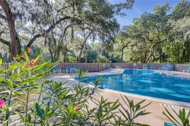Welcome to this beautifully updated one level, end-unit on Sea Pines Golf and Resort  in South Carolina - for sale on GolfHomes.com, golf home, golf lot