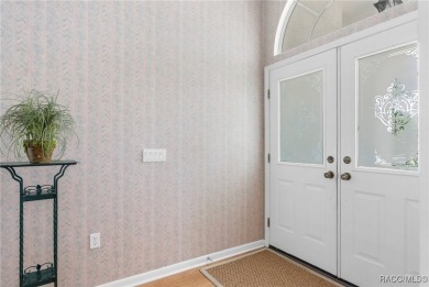 Welcome to this spacious pool home, situated in the Seven Hills on Oak Hills Country Club in Florida - for sale on GolfHomes.com, golf home, golf lot