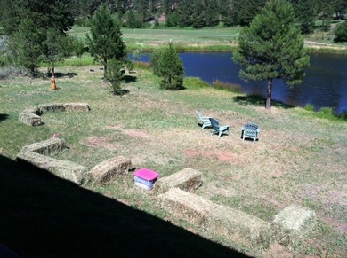 Large, single-level, pond-front home full of natural lighting on Meadowcreek Golf Resort in Idaho - for sale on GolfHomes.com, golf home, golf lot