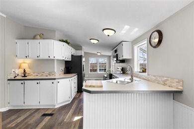 GEM ON THE LAKE - UNBEATABLE VALUE IN LINN VALLEY LAKES! on Linn Valley Lakes - Deer Trace Golf Course in Kansas - for sale on GolfHomes.com, golf home, golf lot