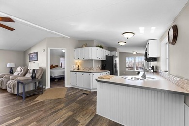 GEM ON THE LAKE - UNBEATABLE VALUE IN LINN VALLEY LAKES! on Linn Valley Lakes - Deer Trace Golf Course in Kansas - for sale on GolfHomes.com, golf home, golf lot