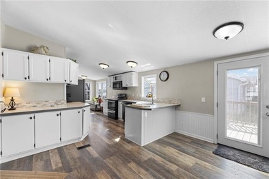 GEM ON THE LAKE - UNBEATABLE VALUE IN LINN VALLEY LAKES! on Linn Valley Lakes - Deer Trace Golf Course in Kansas - for sale on GolfHomes.com, golf home, golf lot