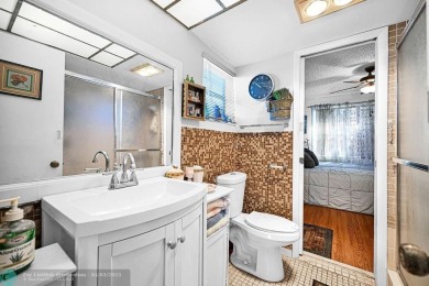 Welcome to this unique 2-bedroom, 2-bathroom corner unit on the on Sunrise Lakes Phase IV Golf Course in Florida - for sale on GolfHomes.com, golf home, golf lot