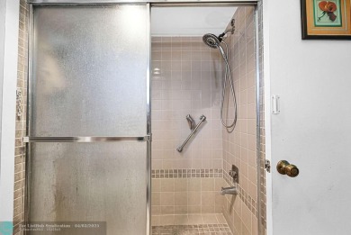 Welcome to this unique 2-bedroom, 2-bathroom corner unit on the on Sunrise Lakes Phase IV Golf Course in Florida - for sale on GolfHomes.com, golf home, golf lot