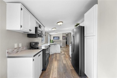 GEM ON THE LAKE - UNBEATABLE VALUE IN LINN VALLEY LAKES! on Linn Valley Lakes - Deer Trace Golf Course in Kansas - for sale on GolfHomes.com, golf home, golf lot