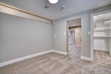 Do not miss this one! Move-in ready, GORGEOUS open, light-filled on Twin Peaks Golf Course in Colorado - for sale on GolfHomes.com, golf home, golf lot
