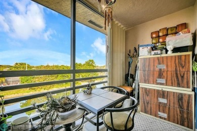 Welcome to this unique 2-bedroom, 2-bathroom corner unit on the on Sunrise Lakes Phase IV Golf Course in Florida - for sale on GolfHomes.com, golf home, golf lot