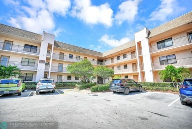 Welcome to this unique 2-bedroom, 2-bathroom corner unit on the on Sunrise Lakes Phase IV Golf Course in Florida - for sale on GolfHomes.com, golf home, golf lot