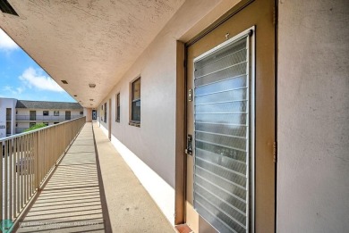 Welcome to this unique 2-bedroom, 2-bathroom corner unit on the on Sunrise Lakes Phase IV Golf Course in Florida - for sale on GolfHomes.com, golf home, golf lot