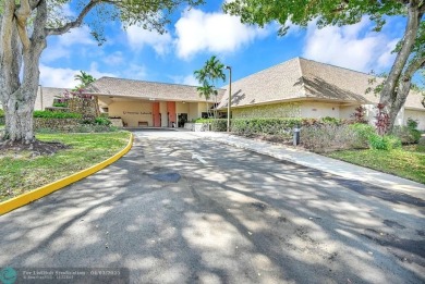Welcome to this unique 2-bedroom, 2-bathroom corner unit on the on Sunrise Lakes Phase IV Golf Course in Florida - for sale on GolfHomes.com, golf home, golf lot