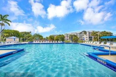 Welcome to this unique 2-bedroom, 2-bathroom corner unit on the on Sunrise Lakes Phase IV Golf Course in Florida - for sale on GolfHomes.com, golf home, golf lot