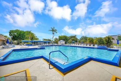 Welcome to this unique 2-bedroom, 2-bathroom corner unit on the on Sunrise Lakes Phase IV Golf Course in Florida - for sale on GolfHomes.com, golf home, golf lot