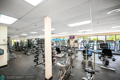 Welcome to this unique 2-bedroom, 2-bathroom corner unit on the on Sunrise Lakes Phase IV Golf Course in Florida - for sale on GolfHomes.com, golf home, golf lot