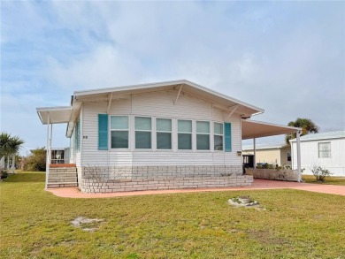 Welcome home to this beautifully maintained property in the on Apollo Beach Golf and Sea Club in Florida - for sale on GolfHomes.com, golf home, golf lot