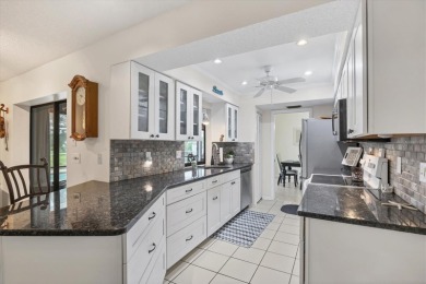 This beautifully maintained 3-bedroom, 2-bathroom pool home on Rotonda Golf and Country Club The Palms Course in Florida - for sale on GolfHomes.com, golf home, golf lot