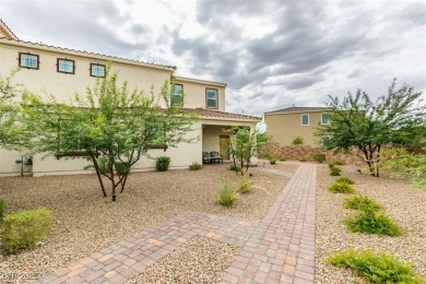 ENJOY THIS RESORT STYLE LIVING IN THE HIGHLY DESIRABLE GUARD on Tuscany Golf Club in Nevada - for sale on GolfHomes.com, golf home, golf lot