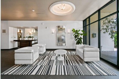 Nestled high above the lush Palm Beach treetops, The Aerie at on The President Country Club in Florida - for sale on GolfHomes.com, golf home, golf lot