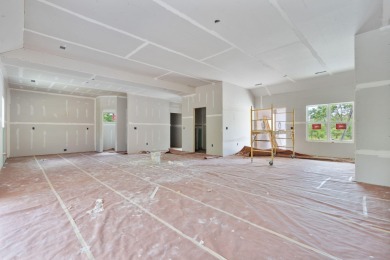 Tucked inside a gated golf community, this newly constructed on Ledgestone Country Club and Golf Course in Missouri - for sale on GolfHomes.com, golf home, golf lot