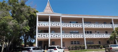 Welcome home to your beautifully updated top floor END unit on On Top Of The World Golf Course in Florida - for sale on GolfHomes.com, golf home, golf lot